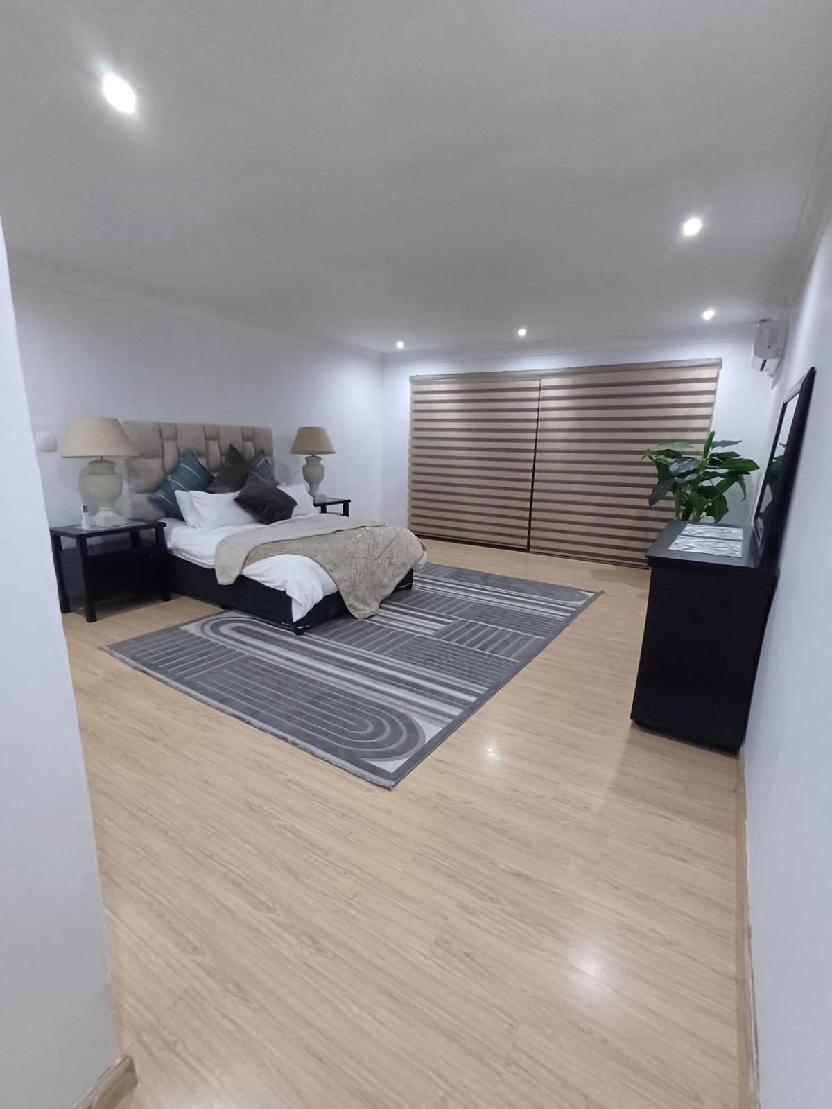 Spacious main bedroom inside Bait 1 in Marlboro Gardens